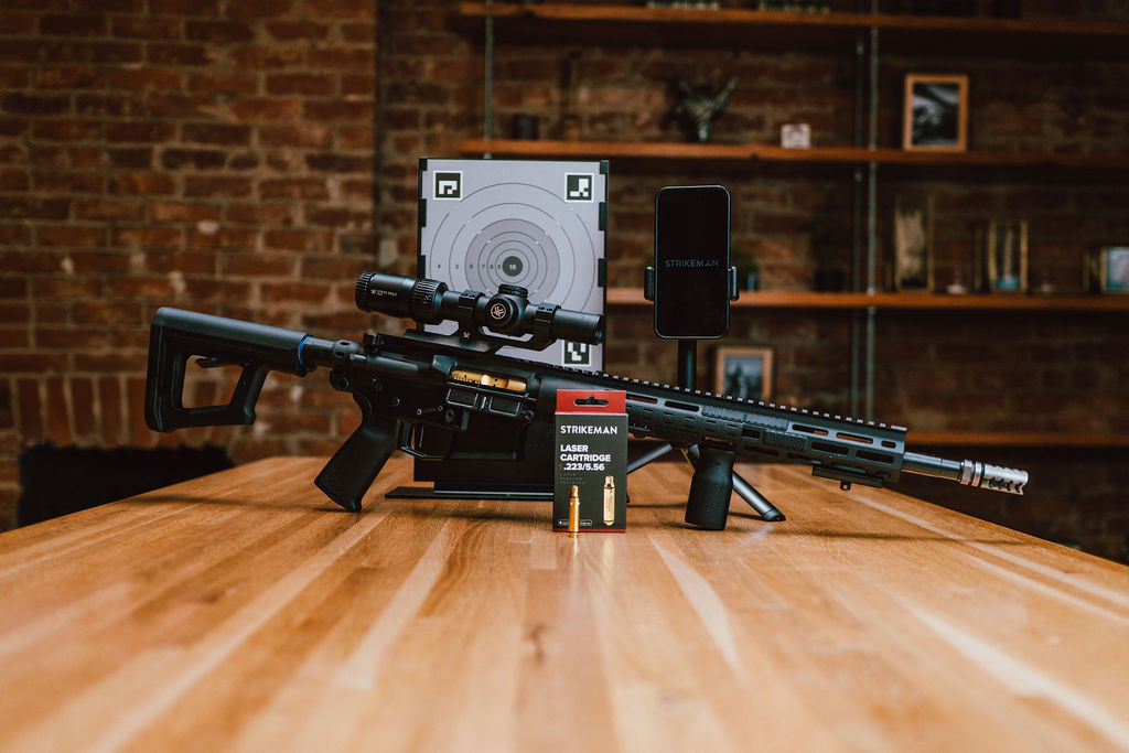 Strikeman dry-fire training system set up on a table